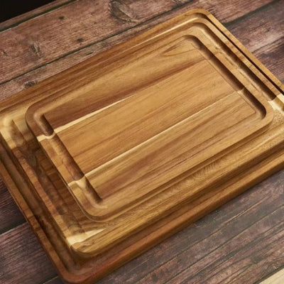 trois planche à découper bois superposées